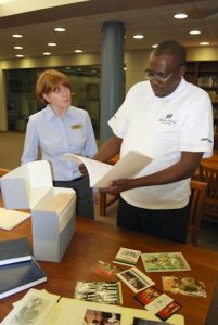 Valerie Love and Thulani Mabaso, a researcher/speaker from S. Africa at the Thomas J. Dodd Research Center.